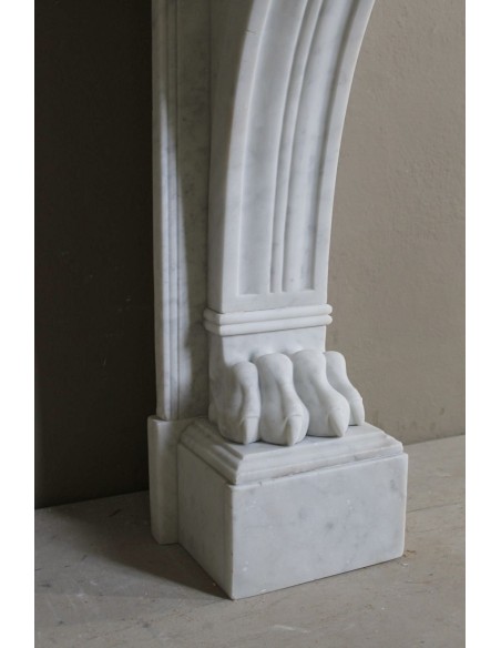 Antique marble mantel carved in white marble, with lion's paw details. This fireplace is original, authentic, a unique piece.