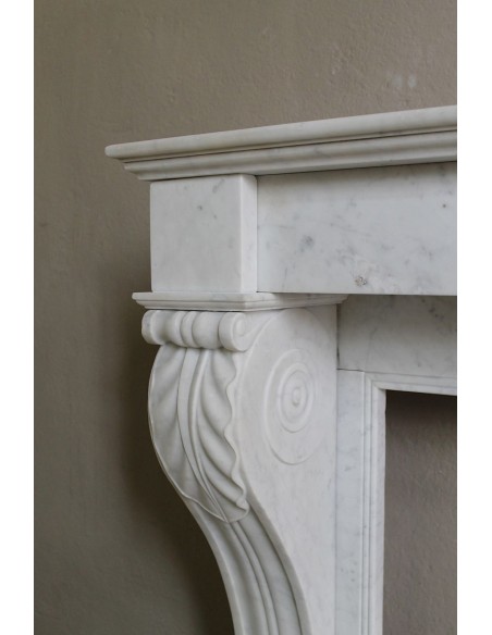 Antique marble mantel carved in white marble, with lion's paw details. This fireplace is original, authentic, a unique piece.