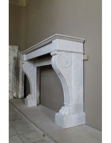 Antique marble mantel carved in white marble, with lion's paw details. This fireplace is original, authentic, a unique piece.