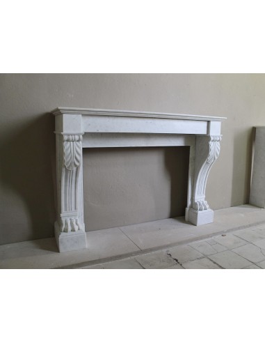 Antique marble mantel carved in white marble, with lion's paw details. This fireplace is original, authentic, a unique piece.