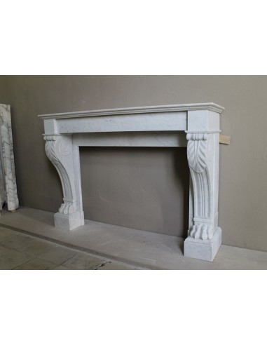 Antique marble mantel carved in white marble, with lion's paw details. This fireplace is original, authentic, a unique piece.