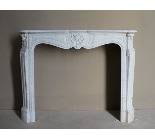 Louis XV “Trois Coquilles” fireplace mantel in white Carrara marble, Baroque style and 19th century, at a discounted price.