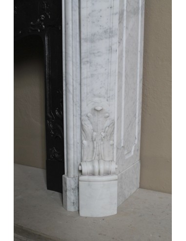 Floral Louis XV fireplace mantel carved in white marble, with shell decorations, complete with its original cast iron insert.