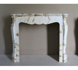 Antique Louis XV Pied Galbé mantelpiece in Paonazzetto marble. This is a highly refined mantelpiece in a stunning marble.