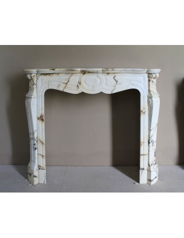 Antique Louis XV Pied Galbé mantelpiece in Paonazzetto marble. This is a highly refined mantelpiece in a stunning marble.
