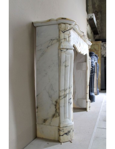 Antique Louis XV Pied Galbé mantelpiece in Paonazzetto marble. This is a highly refined mantelpiece in a stunning marble.
