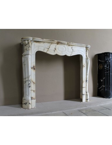 Antique Louis XV Pied Galbé mantelpiece in Paonazzetto marble. This is a highly refined mantelpiece in a stunning marble.