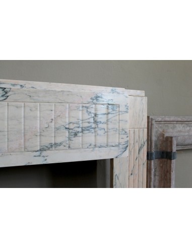 Art Deco mantel carved in veined pink marble called Rosa Portogallo. This antique fireplace comes with its original base.