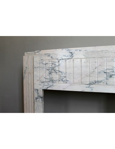 Art Deco mantel carved in veined pink marble called Rosa Portogallo. This antique fireplace comes with its original base.