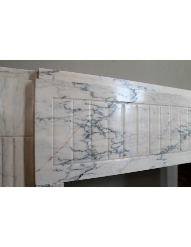 Art Deco mantel carved in veined pink marble called Rosa Portogallo. This antique fireplace comes with its original base.