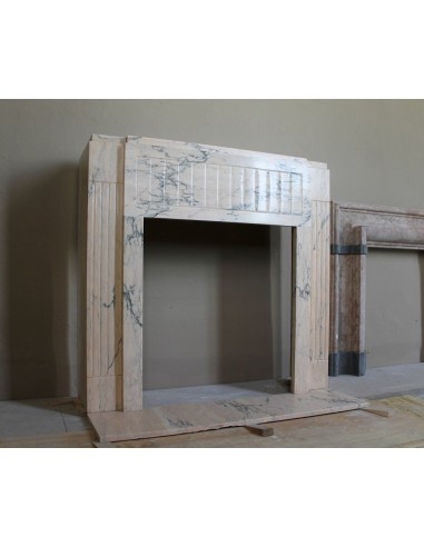 Art Deco mantel carved in veined pink marble called Rosa Portogallo. This antique fireplace comes with its original base.