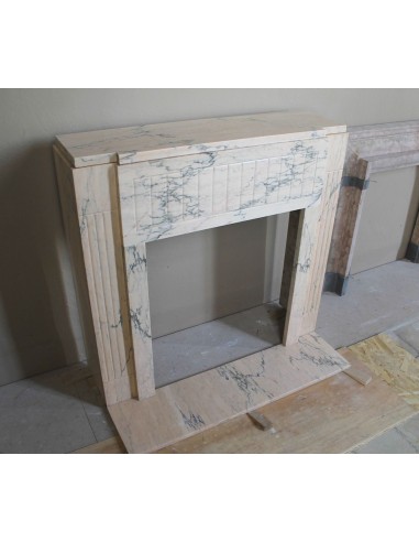 Art Deco mantel carved in veined pink marble called Rosa Portogallo. This antique fireplace comes with its original base.