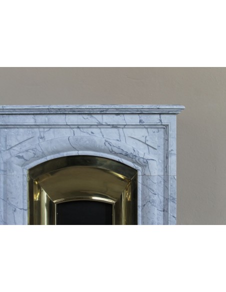 Small "Boudin" fireplace mantel in blue-toned marble with its original gilded brass insert featuring a sliding shutter.