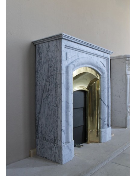 Small "Boudin" fireplace mantel in blue-toned marble with its original gilded brass insert featuring a sliding shutter.