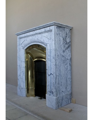 Small "Boudin" fireplace mantel in blue-toned marble with its original gilded brass insert featuring a sliding shutter.