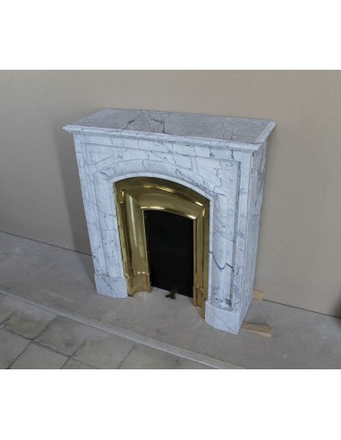 Small "Boudin" fireplace mantel in blue-toned marble with its original gilded brass insert featuring a sliding shutter.
