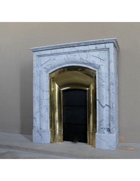 Small "Boudin" fireplace mantel in blue-toned marble with its original gilded brass insert featuring a sliding shutter.