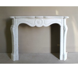 Antique fireplace mantel in Pure White marble, Baroque style, with floral motifs, offered at a discounted price.