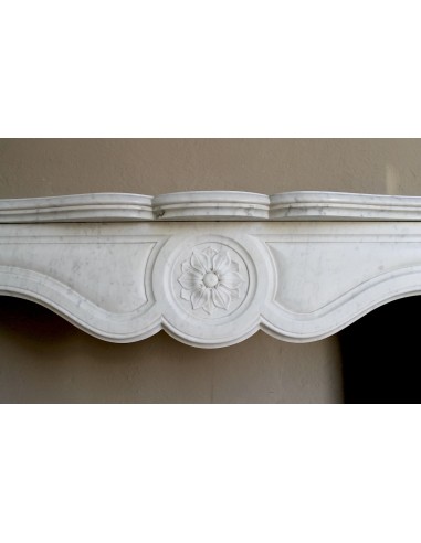 Antique fireplace mantel in Pure White marble, Baroque style, with floral motifs, offered at a discounted price.