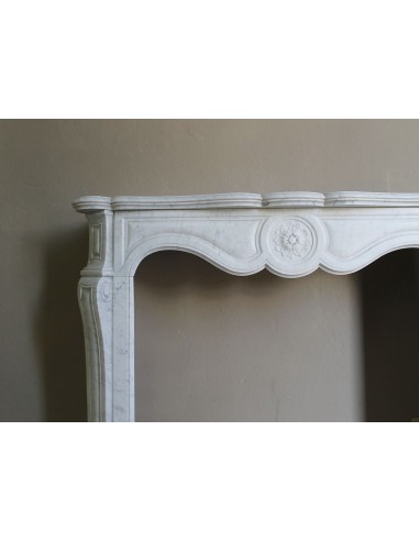 Antique fireplace mantel in Pure White marble, Baroque style, with floral motifs, offered at a discounted price.