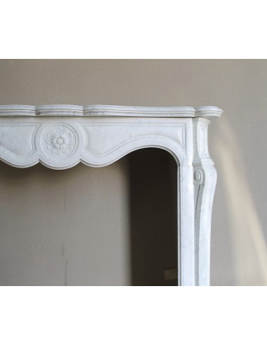Antique fireplace mantel in Pure White marble, Baroque style, with floral motifs, offered at a discounted price.