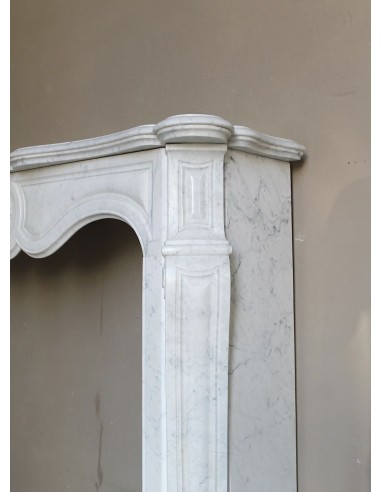 Antique fireplace mantel in Pure White marble, Baroque style, with floral motifs, offered at a discounted price.