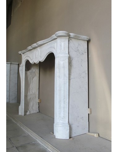 Antique fireplace mantel in Pure White marble, Baroque style, with floral motifs, offered at a discounted price.