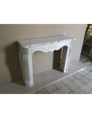 Antique fireplace mantel in Pure White marble, Baroque style, with floral motifs, offered at a discounted price.