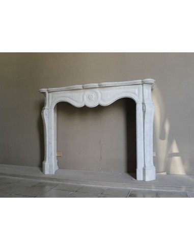 Antique fireplace mantel in Pure White marble, Baroque style, with floral motifs, offered at a discounted price.