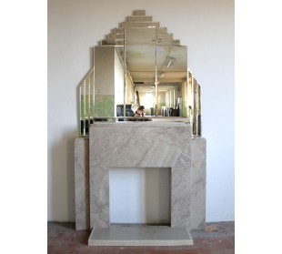 Art Deco fireplace with original mirror, composed of beveled crystal elements. An architectural pair of great design value.