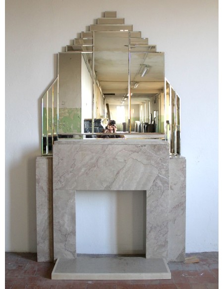 Art Deco fireplace with original mirror, composed of beveled crystal elements. An architectural pair of great design value.