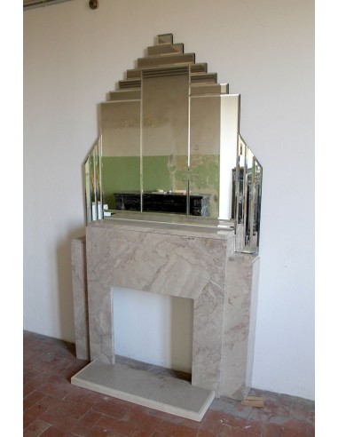 Art Deco fireplace with original mirror, composed of beveled crystal elements. An architectural pair of great design value.