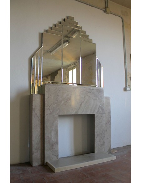 Art Deco fireplace with original mirror, composed of beveled crystal elements. An architectural pair of great design value.