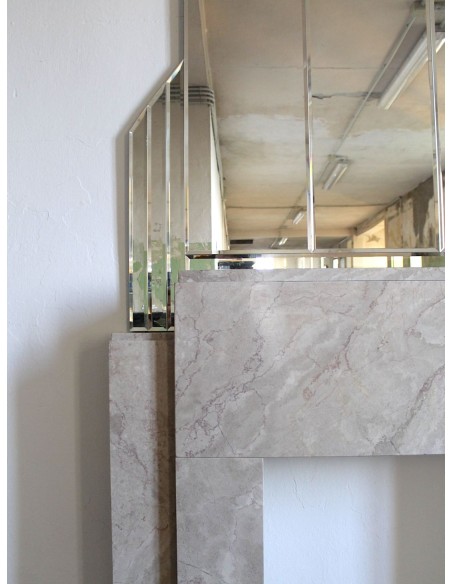 Art Deco fireplace with original mirror, composed of beveled crystal elements. An architectural pair of great design value.