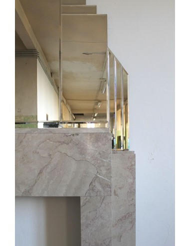 Art Deco fireplace with original mirror, composed of beveled crystal elements. An architectural pair of great design value.