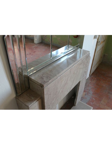 Art Deco fireplace with original mirror, composed of beveled crystal elements. An architectural pair of great design value.