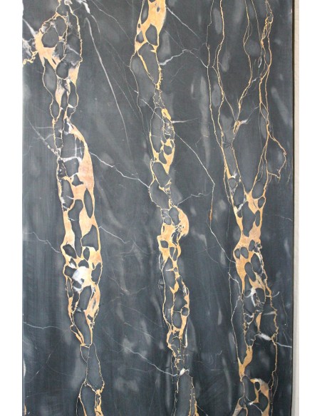 Antique Louis XIV "Boudin" fireplace mantel in exceptional black Portoro marble, complete with its original gilt brass insert.