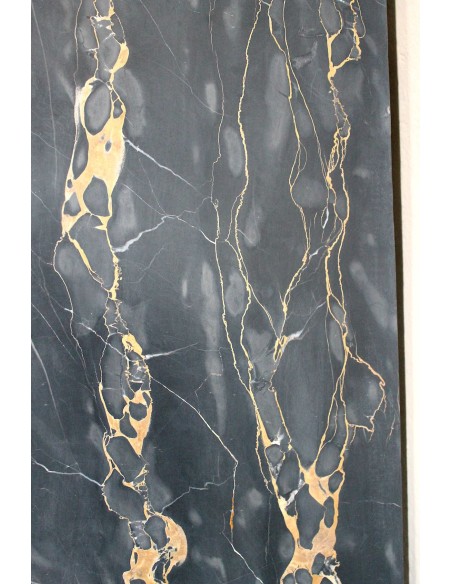 Antique Louis XIV "Boudin" fireplace mantel in exceptional black Portoro marble, complete with its original gilt brass insert.