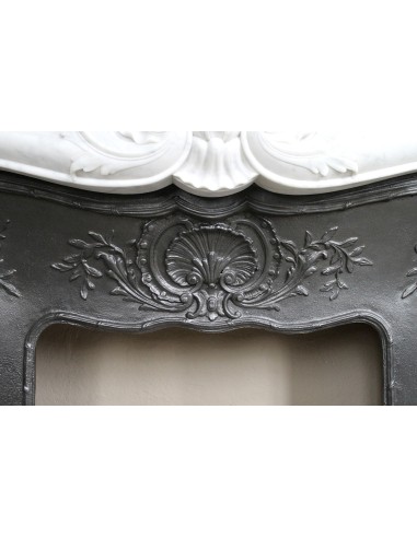 Antique Louis XV fireplace mantel in white marble with elegant floral decorations, with its original artistic cast-iron insert