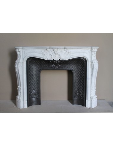 Louis XV “Moustache” fire surround in “Pure White" Carrara marble, complete with cast iron insert featuring floral decorations.