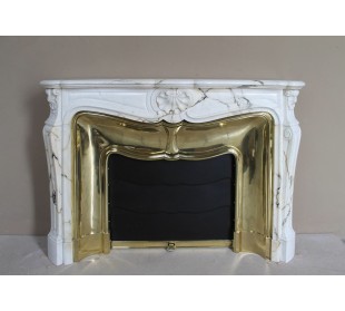 Exceptional Louis XV "Trois Coquilles" fireplace mantel in rare white veined Paonazzetto marble with original gilt brass insert.