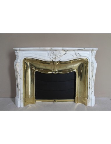 Exceptional Louis XV "Trois Coquilles" fireplace mantel in rare white veined Paonazzetto marble with original gilt brass insert.