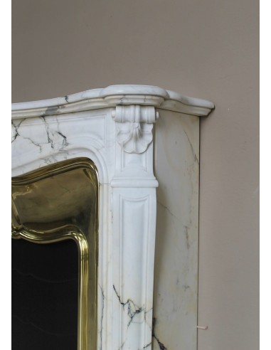 Exceptional Louis XV "Trois Coquilles" fireplace mantel in rare white veined Paonazzetto marble with original gilt brass insert.