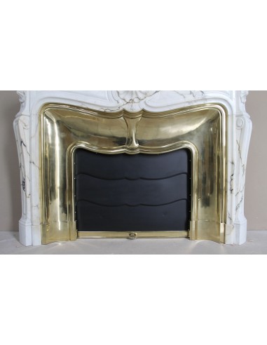 Exceptional Louis XV "Trois Coquilles" fireplace mantel in rare white veined Paonazzetto marble with original gilt brass insert.