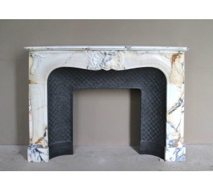 Genuine Baroque fireplace mantel in Calacatta Gold marble with shell carvings, with its original “Tapisserie” cast iron insert.