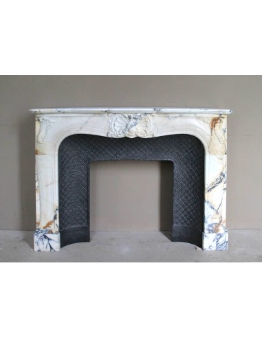 Genuine Baroque fireplace mantel in Calacatta Gold marble with shell carvings, with its original “Tapisserie” cast iron insert.
