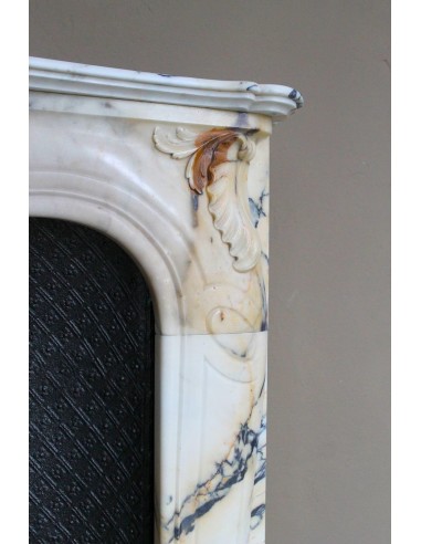 Genuine Baroque fireplace mantel in Calacatta Gold marble with shell carvings, with its original “Tapisserie” cast iron insert.