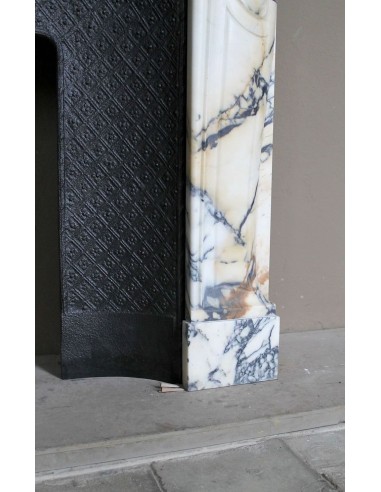 Genuine Baroque fireplace mantel in Calacatta Gold marble with shell carvings, with its original “Tapisserie” cast iron insert.