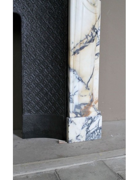 Genuine Baroque fireplace mantel in Calacatta Gold marble with shell carvings, with its original “Tapisserie” cast iron insert.