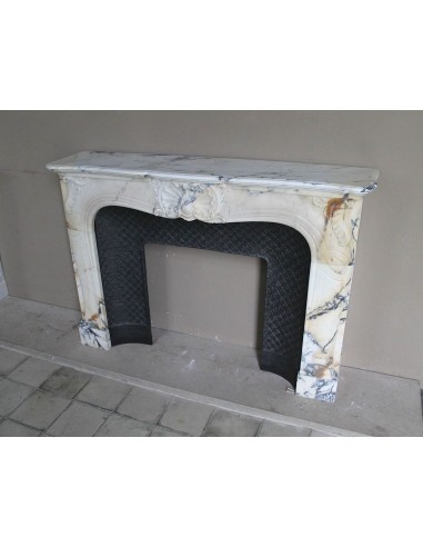 Genuine Baroque fireplace mantel in Calacatta Gold marble with shell carvings, with its original “Tapisserie” cast iron insert.